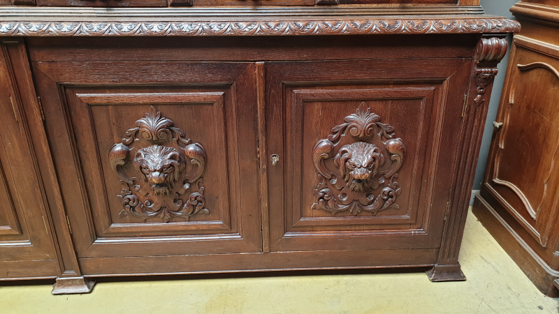 Large oak bookcase with drawers;
