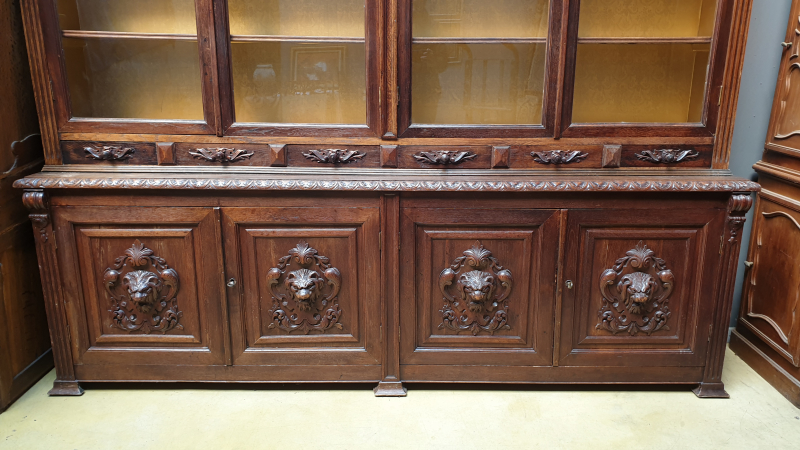 Large oak bookcase with drawers;