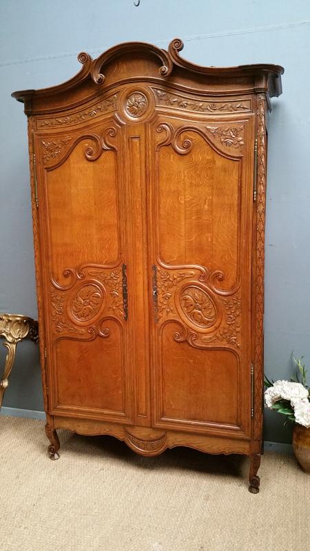 Normandy armoire carved with roses